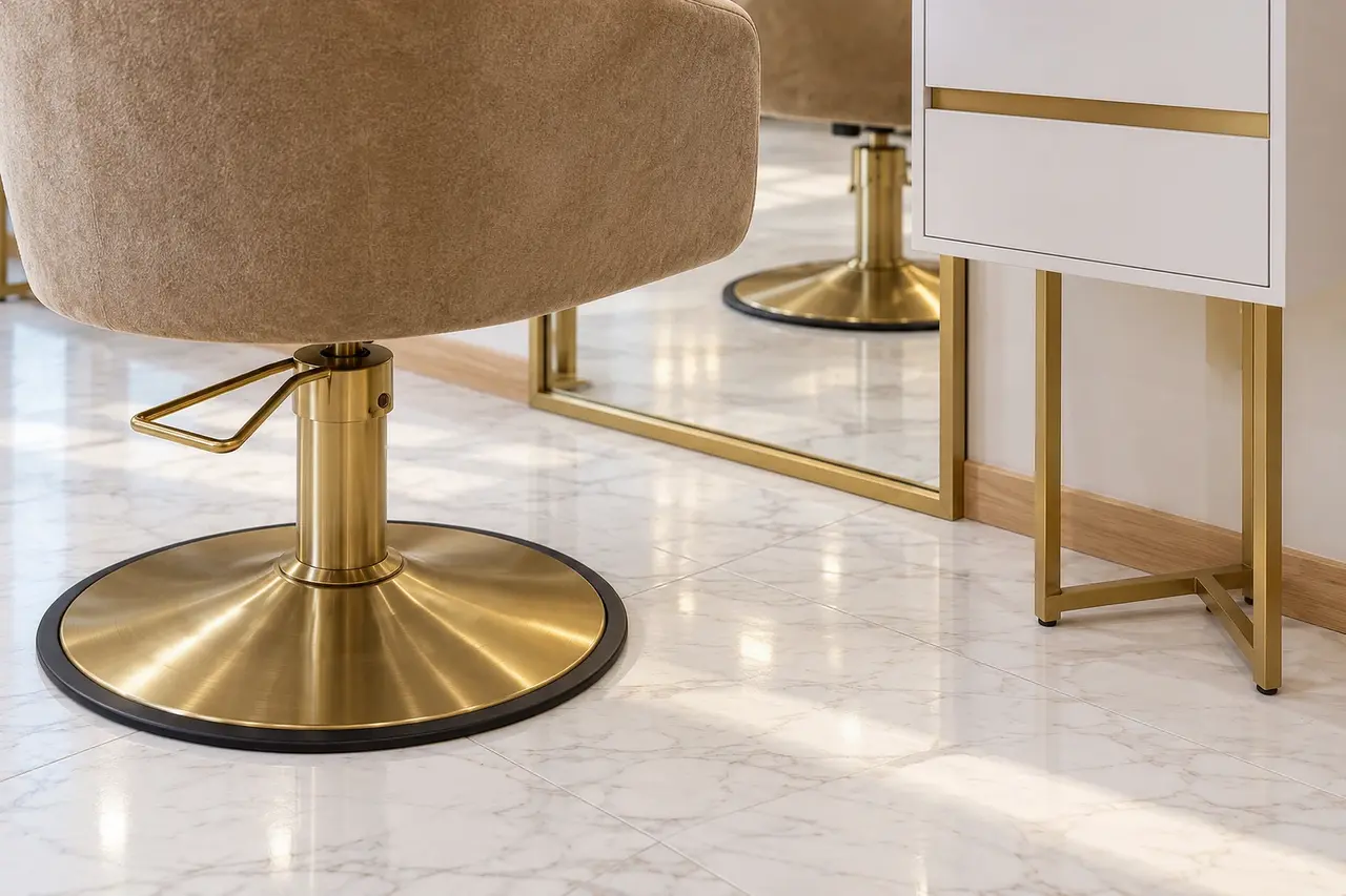 The gold chair pedestal and white station furniture at Rové