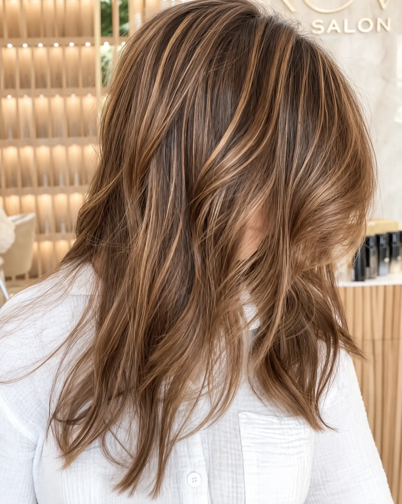 Dimensional balayage in soft brunette waves