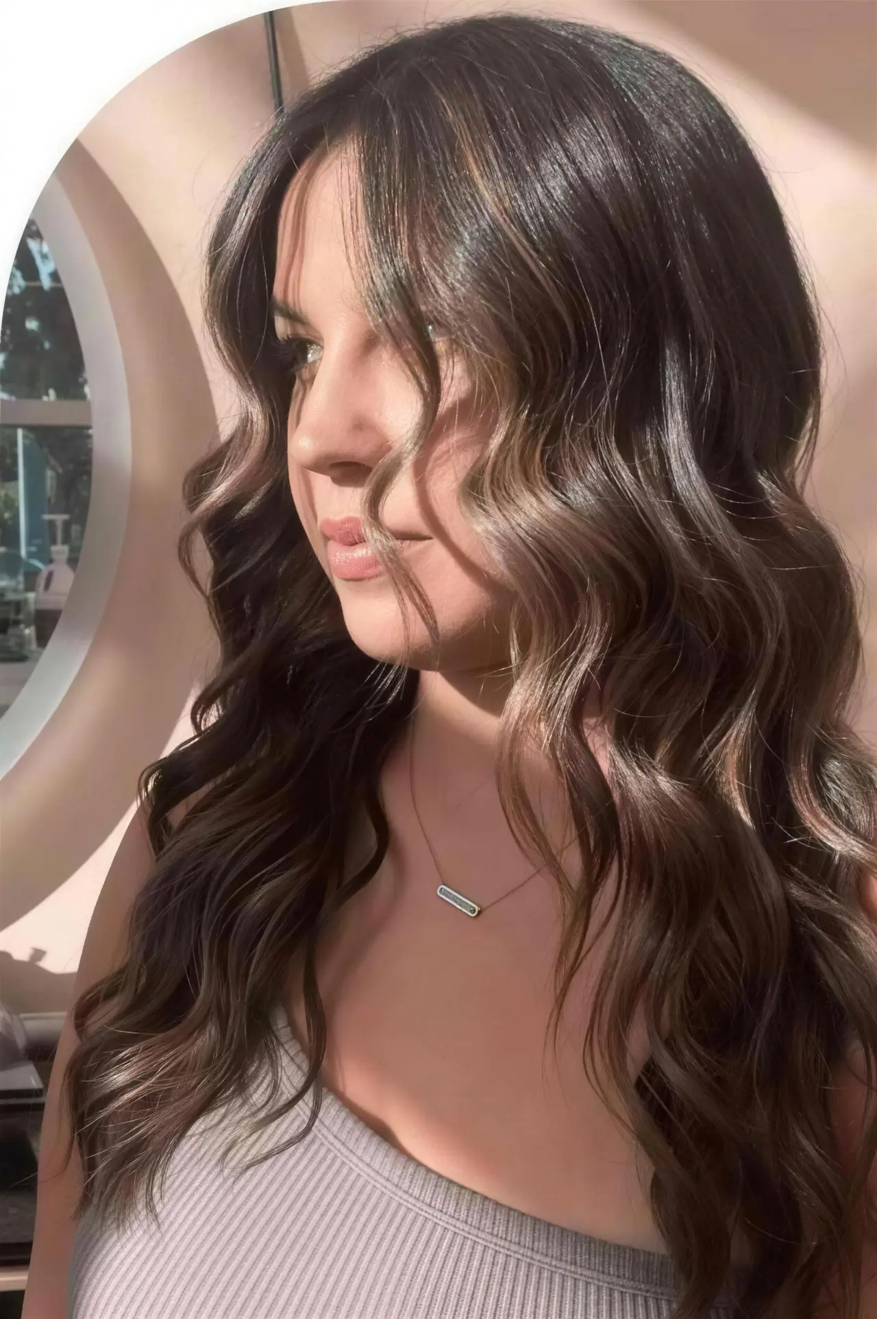 A close portrait showing softly balanced brunette color