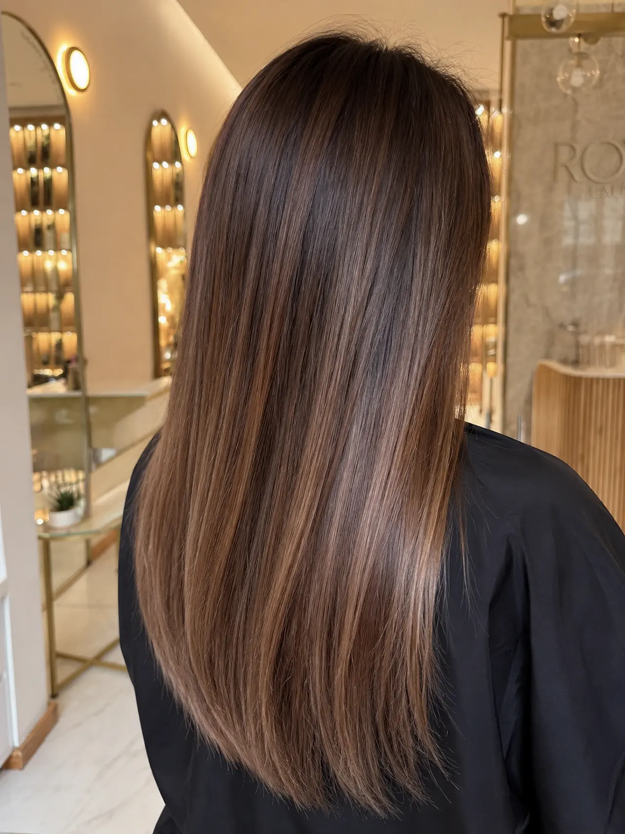Smooth chocolate-brown hair with softly tapered ends