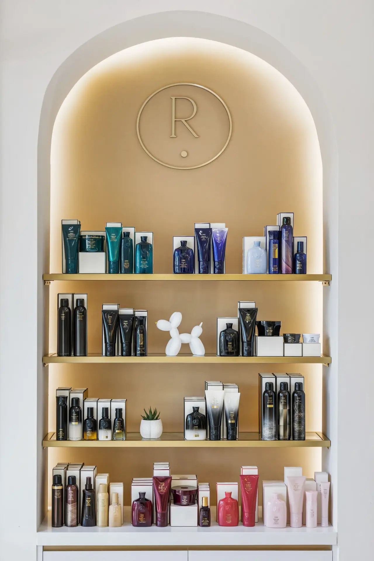The illuminated gold product alcove at Rové